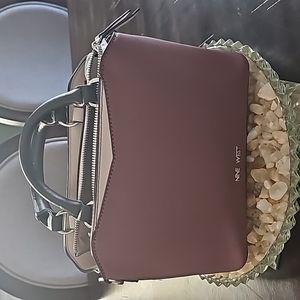 Nine west purse. Very loved. 10 in. X 7 in. Zipper pocket, 2 inside pockets.